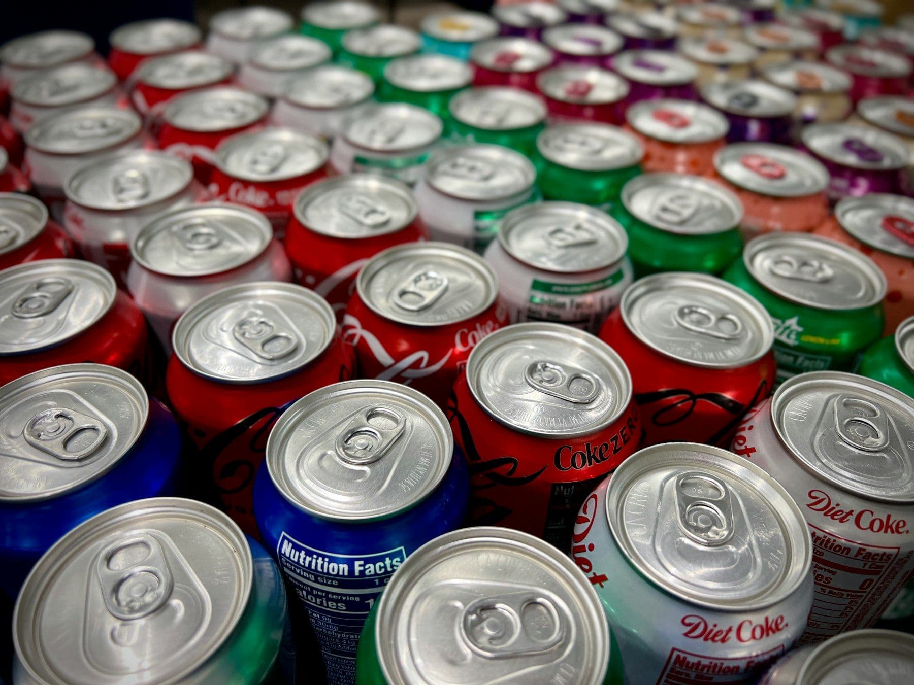 Rows of drinks cans seen from above