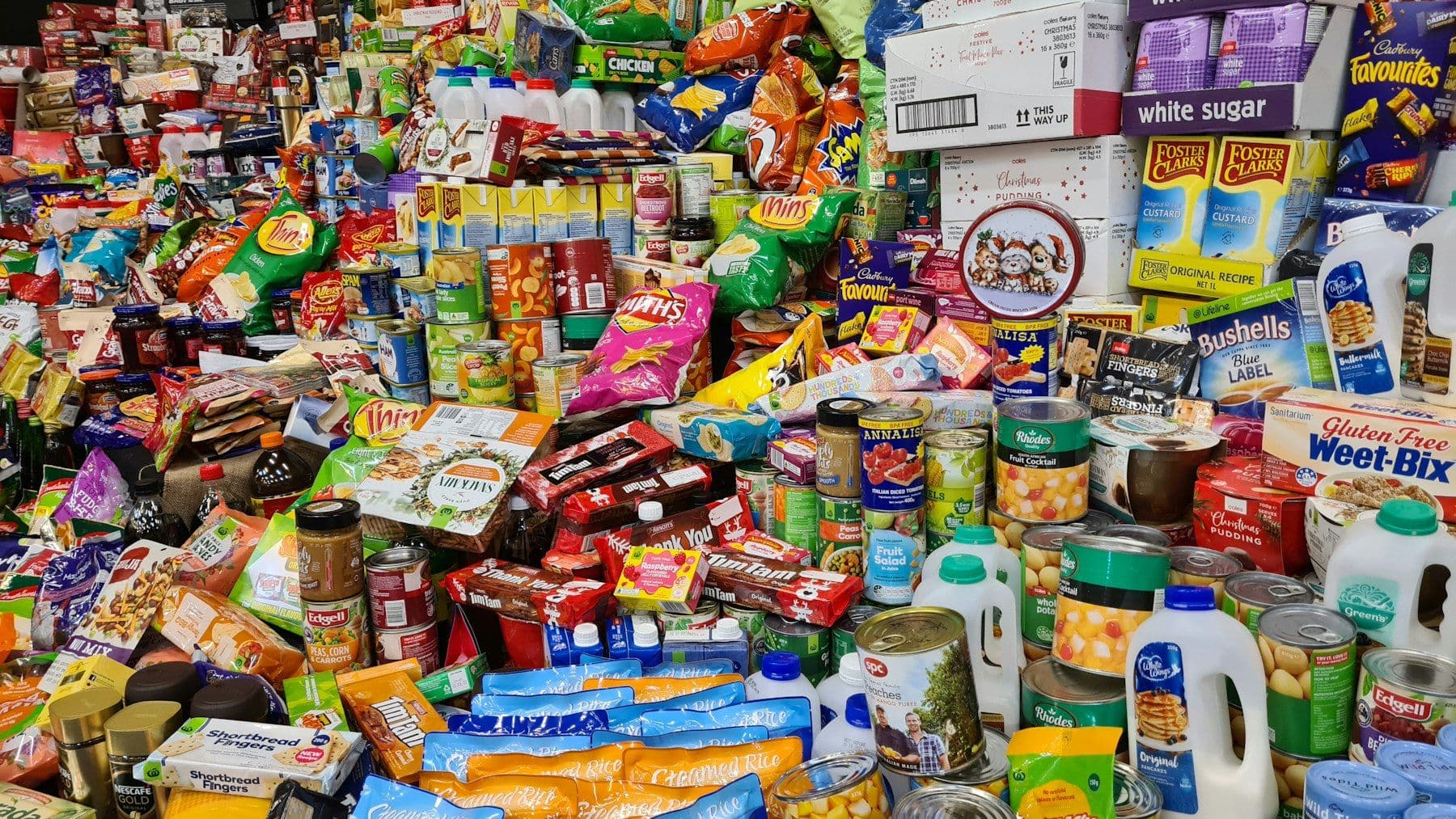 A large mixed heap of branded grocery and household products